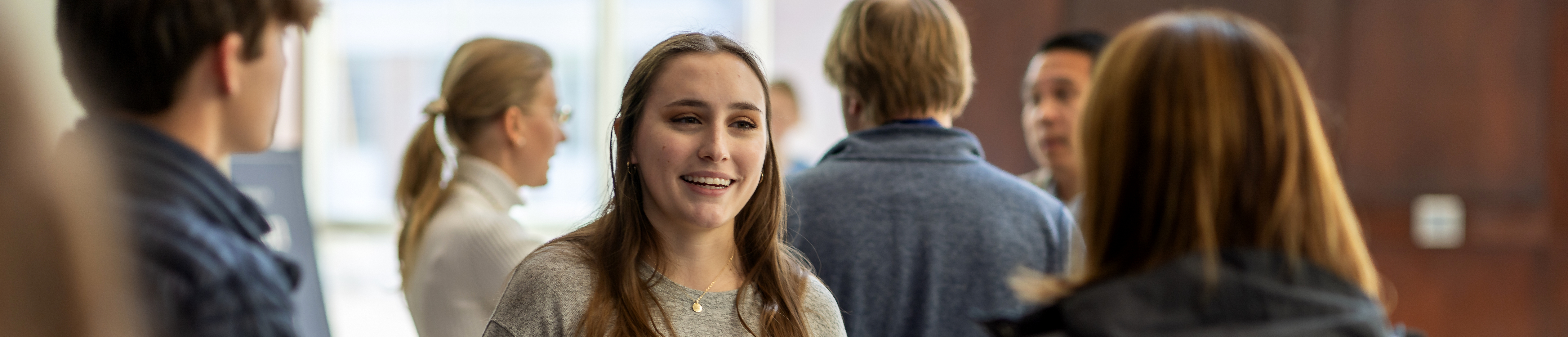 Admissions Worker Helping Guests